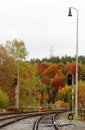 Railway in the autumn with semaphores Royalty Free Stock Photo