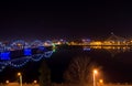 Railway bridge and buildings in Riga at night Royalty Free Stock Photo