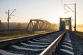 Railway bridge over the Irpin River in the autumn foggy morning.