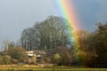 Railway bridge and rainbow, in countryside