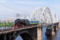 Railway bridge with retro train. Kiev, Ukraine