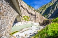 Railway bridge Teufelsbrucke over Reuss river in St. Gotthard mountain range of Swiss Alps near Andermatt