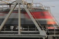 Railway bridge and train rides fast, blurred Royalty Free Stock Photo