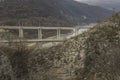 A railway bridge with trains passing over Tsonevo dam.