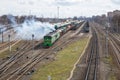 Railway with cargo locomotive with wagons. Many iron ways and trains. Freight train. 2018