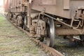 Railway carriage is standing on the rails, awaiting the loading of a cargo that is important to people Royalty Free Stock Photo