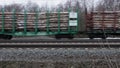 Railway carriages with roundwood