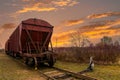 Railway containers with bulk materials.Sunset time Royalty Free Stock Photo