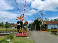 Railway Crossing in Country with blue sky background