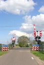 Landscape with rural railway crossing in Soest, Eempolder,Netherlands Royalty Free Stock Photo