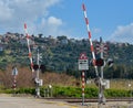 Railway crossing with signs on the rail road Royalty Free Stock Photo