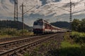Železničná elektrická trať pri stanici Liptovský Hrádok v lete slnečné ráno