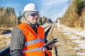 Railway employee with tablet PC on the railway