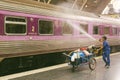 Railway employees doing cleaning train to prepare service for th