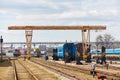 Railway gantry crane at point of uncoupled repair of locomotives railway carriages and trains at depot station Grodno or Hrodna Royalty Free Stock Photo