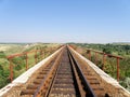 The railway goes across the bridge . Royalty Free Stock Photo
