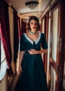 Railway journey woman in vintage train compartment