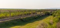Railway in Kazakhstan steppe in spring Royalty Free Stock Photo