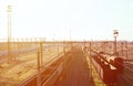 Railway landscape with many old railroad freight cars on the rails. Classic sunny day on the railroa Royalty Free Stock Photo