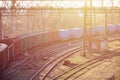 Railway landscape with many old railroad freight cars on the rails. Classic sunny day on the railroa Royalty Free Stock Photo