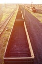 Railway landscape with many old railroad freight cars on the rails. Classic sunny day on the railroa Royalty Free Stock Photo