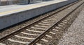 Railway Lines Closeup, Train Tracks with Track Ballast Stones, Metal Rails, Old Railway Track Royalty Free Stock Photo