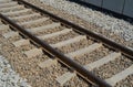 Railway Lines Closeup, Train Tracks with Track Ballast Stones, Metal Rails, Old Railway Track Royalty Free Stock Photo