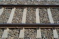 Railway Lines Closeup, Train Tracks with Track Ballast Stones, Metal Rails, Old Railway Track Royalty Free Stock Photo