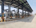 Railway loading station with arms and metering systems for loading petrol products with loading equipment