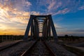 Railway bridge on sunset sky background Royalty Free Stock Photo