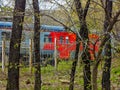 The railway, metal security fence and small vegetation are a tiny part of Moscow.