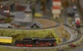 Railway model with steam locomotive and landscape details Royalty Free Stock Photo