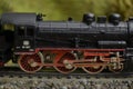 Railway model with steam locomotive and landscape details Royalty Free Stock Photo