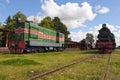 Railway Museum in the town of Haapsalu. In the foreground is the old locomotive and the train station. Scene Royalty Free Stock Photo