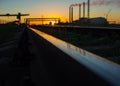 Railway. Plant. Factory. Beautiful sunset.