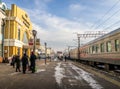 The railway platform and the passengers waiting for the train in Ulan-Ude, Republic of Buryatia, Russia.