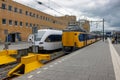 Railway platform with trains ready for departure, Dutch city Groningen