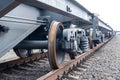 Railway platform wheels on rails for the transportation of high-tonnage cargo. Royalty Free Stock Photo