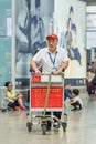 Railway porter at Beijing Railway Station South, China