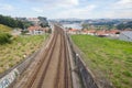 Railway rail tracks railroad train suburban small town river landscape aerial panorama view Royalty Free Stock Photo