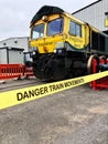 Railway safety sign stating danger train movements