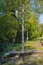 Railway semaphore on the background of foliage and trees Royalty Free Stock Photo