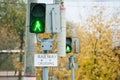 Railway sign and green traffic light Royalty Free Stock Photo