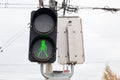 Railway sign and green traffic light Royalty Free Stock Photo