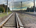 Railway station against beautiful sky at sunset. Industrial landscape with railroad Royalty Free Stock Photo