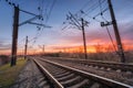 Railway station against beautiful sky at sunset. Railroad Royalty Free Stock Photo