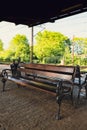 Railway station with empty bench. The way forward railway for train. Empty Railway track for locomotive. Transportation Royalty Free Stock Photo