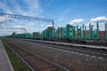 railway station with empty freight cars for timber logs