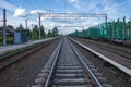 railway station with empty freight cars for timber logs