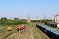 Railway station with freight cars on a summer day. Royalty Free Stock Photo